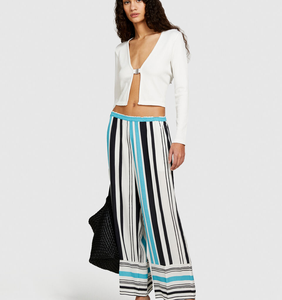 Printed satin trousers - women's flared trousers - Multi-color | Sisley image number 1